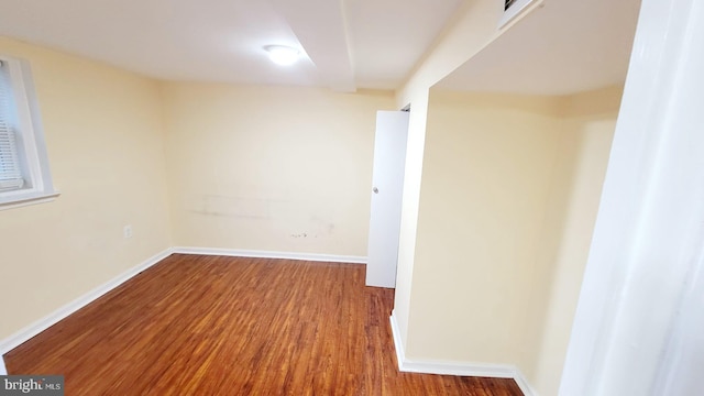 empty room featuring hardwood / wood-style flooring