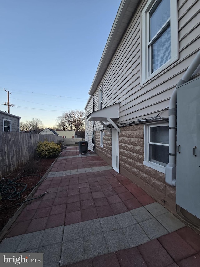 view of patio / terrace with central AC unit