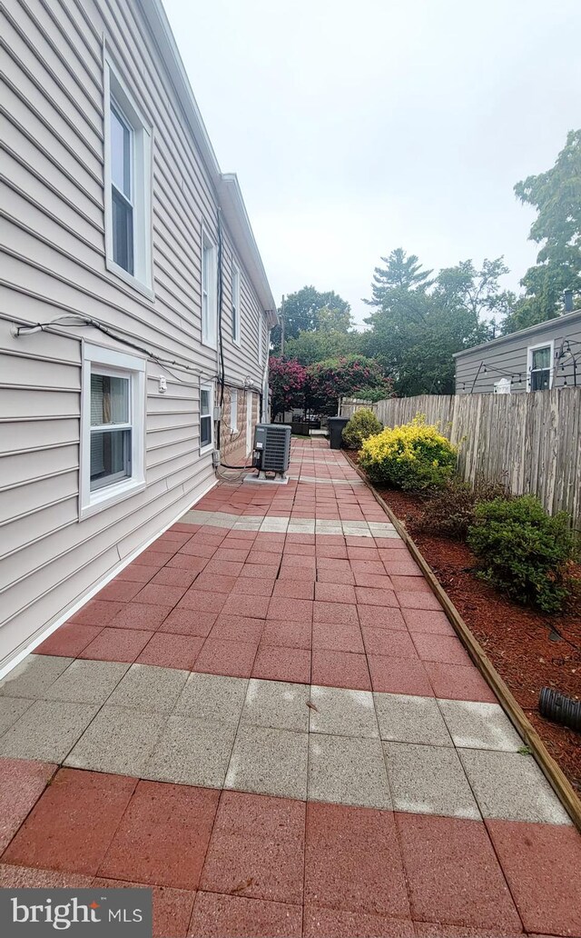 view of patio with cooling unit