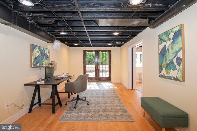 office space featuring french doors and wood-type flooring