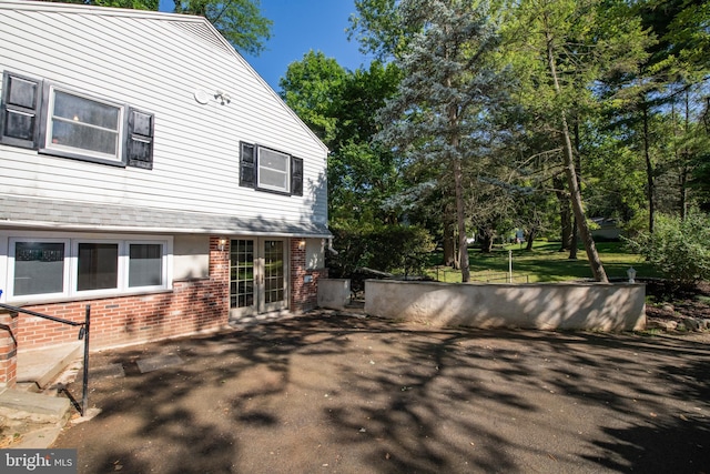 view of home's exterior with a patio