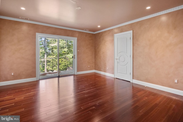 unfurnished room featuring dark hardwood / wood-style flooring and crown molding