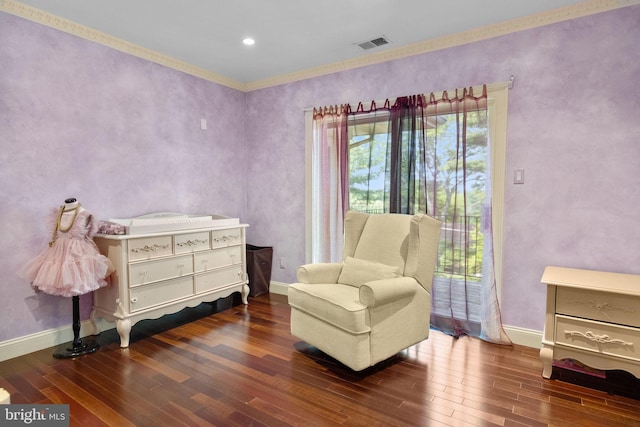 sitting room with dark hardwood / wood-style flooring