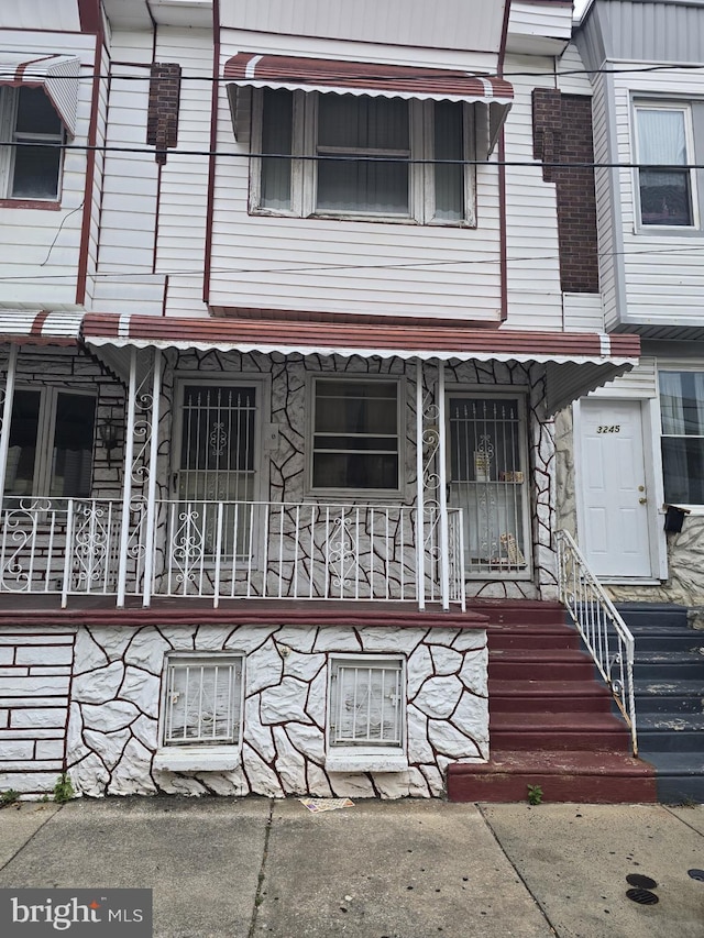 multi unit property featuring covered porch