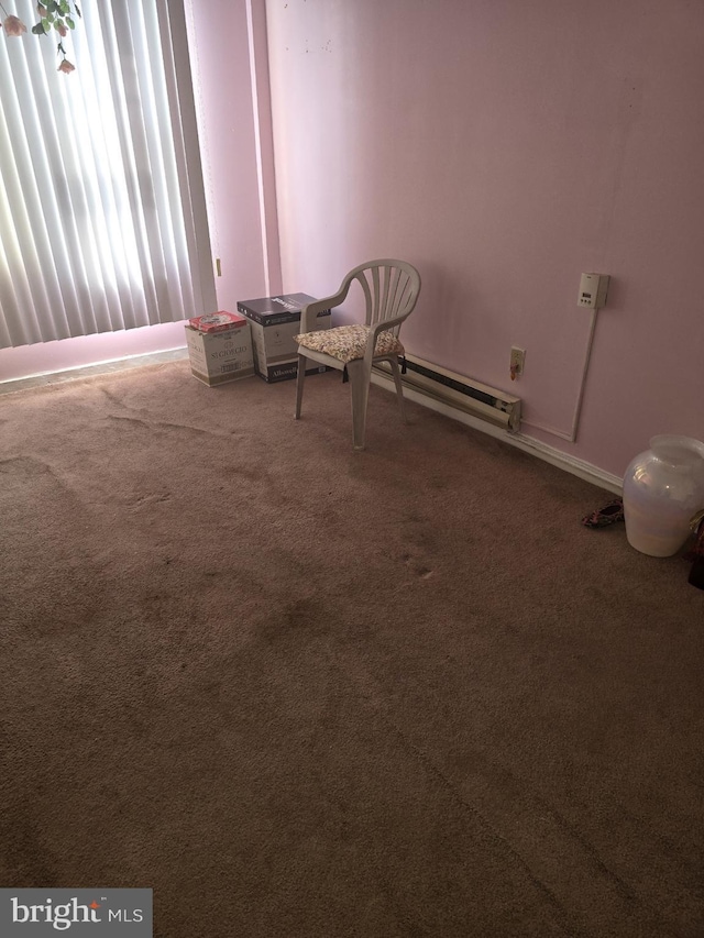 unfurnished room featuring carpet flooring