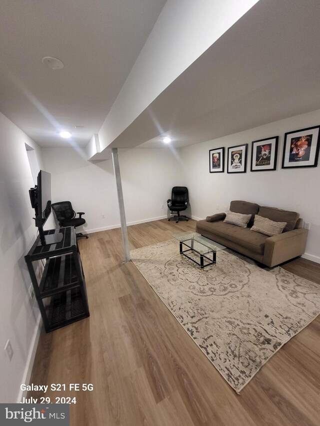 living room with hardwood / wood-style flooring