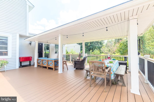 deck with an outdoor hangout area