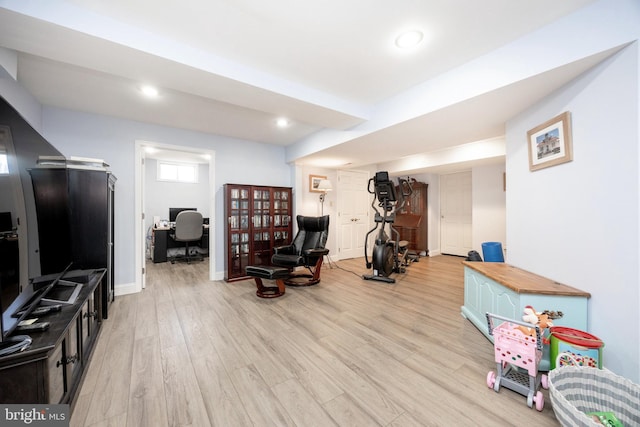 interior space featuring recessed lighting, light wood-style flooring, and baseboards