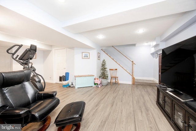 interior space featuring stairs, light wood finished floors, recessed lighting, and baseboards