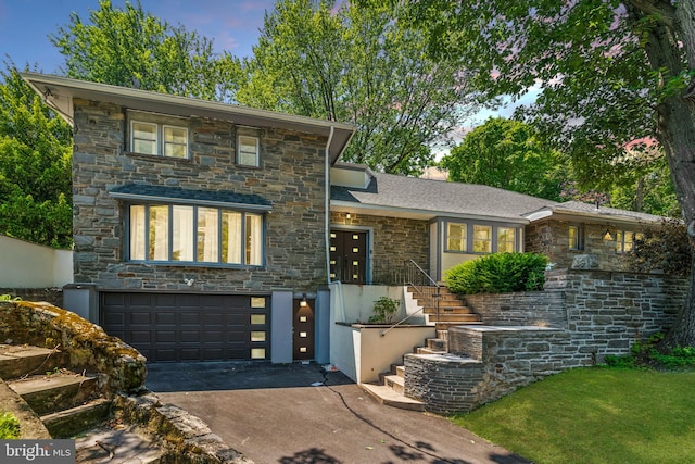 view of front of home featuring a garage