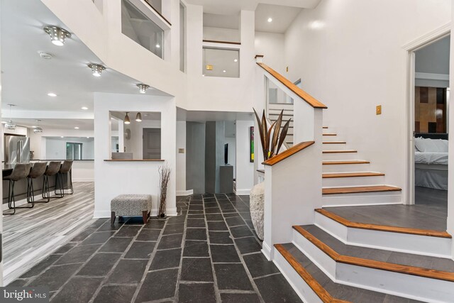 stairway with wood-type flooring