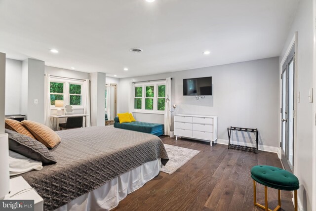 sitting room with dark hardwood / wood-style flooring