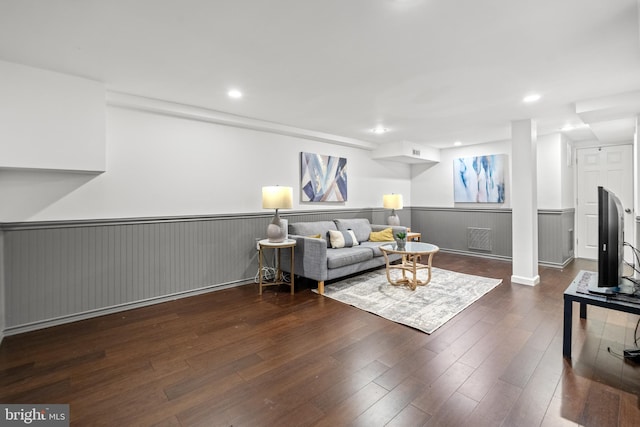 living room with dark hardwood / wood-style floors