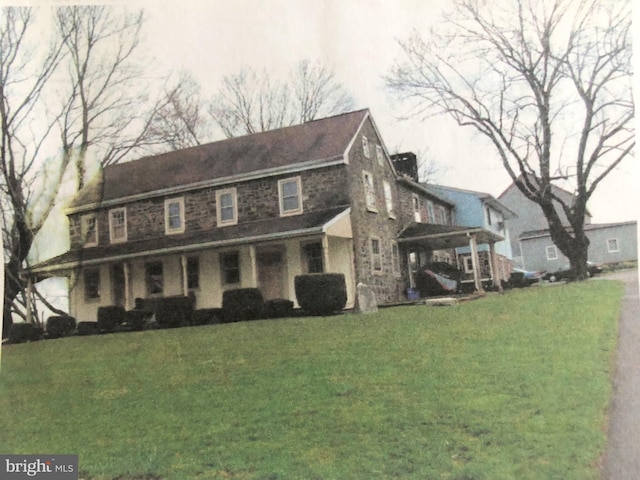 1171 Old Sumneytown Pike, Harleysville, PA 19438 - view of home's exterior with a yard and a carport