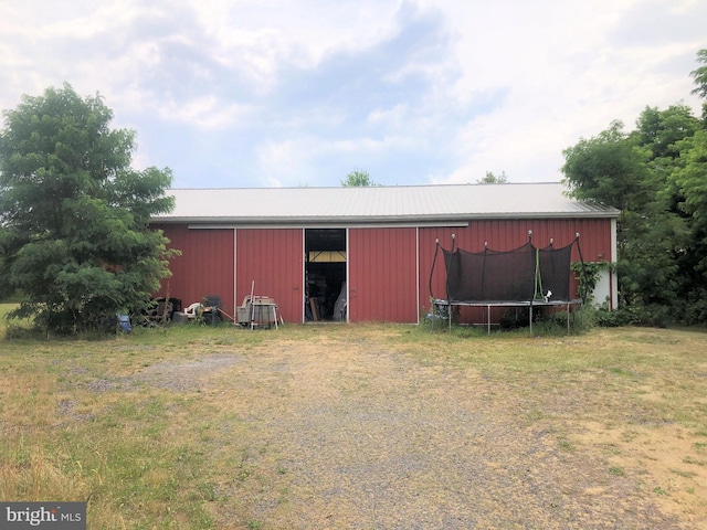 view of outdoor structure with a trampoline