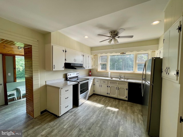 kitchen with white cabinetry, ceiling fan, sink, light hardwood / wood-style flooring, and appliances with stainless steel finishes