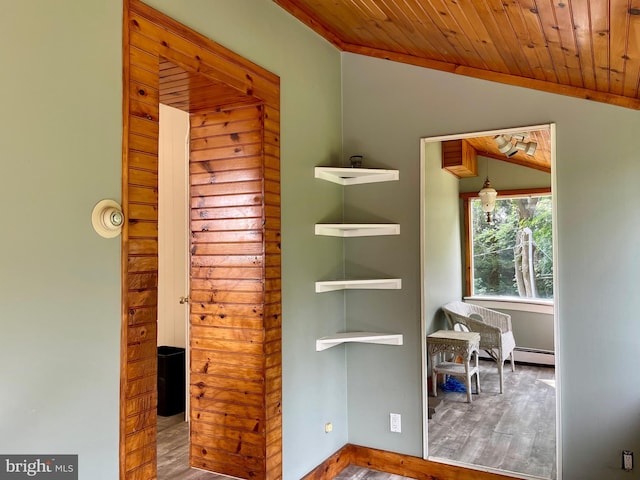 interior space with wooden ceiling, light hardwood / wood-style floors, and vaulted ceiling