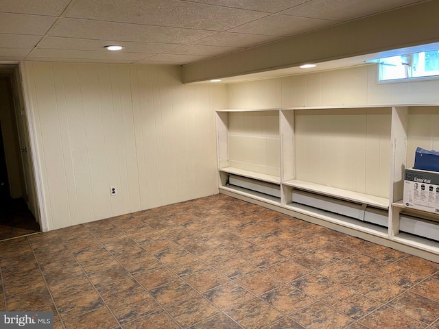 basement with wood walls