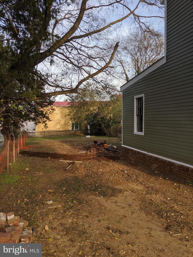 view of yard at dusk