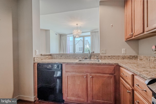 kitchen featuring sink, hanging light fixtures, a notable chandelier, and black dishwasher