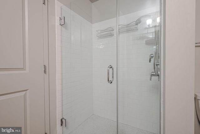 bathroom featuring walk in shower