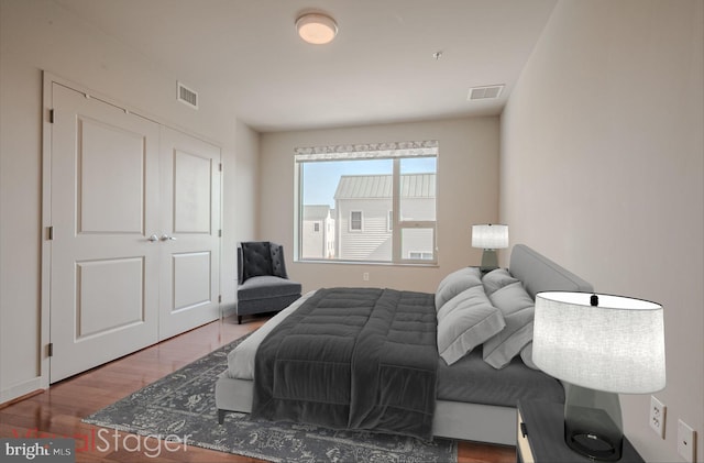 bedroom with wood-type flooring