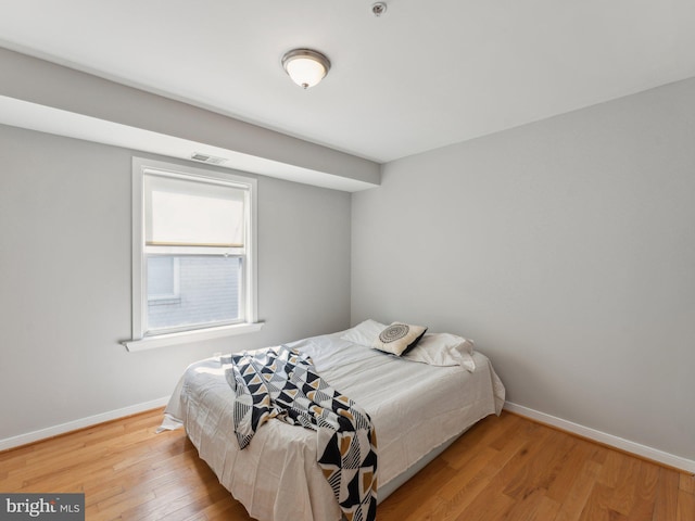 bedroom featuring light hardwood / wood-style flooring