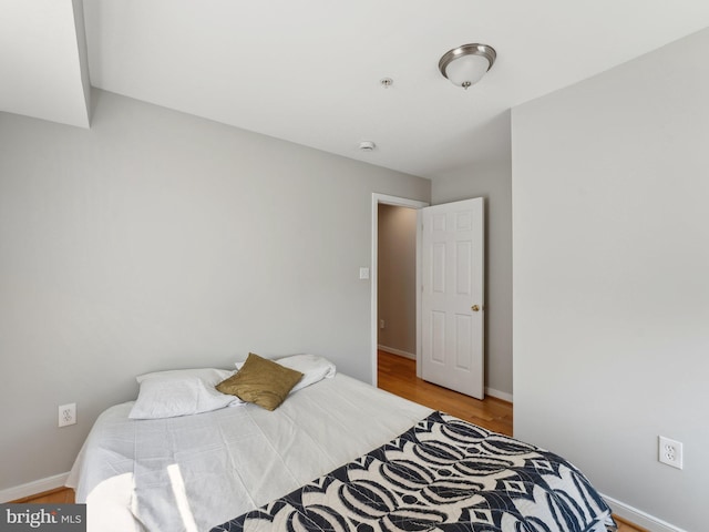 bedroom featuring hardwood / wood-style flooring