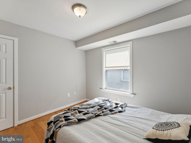 bedroom featuring light wood-type flooring