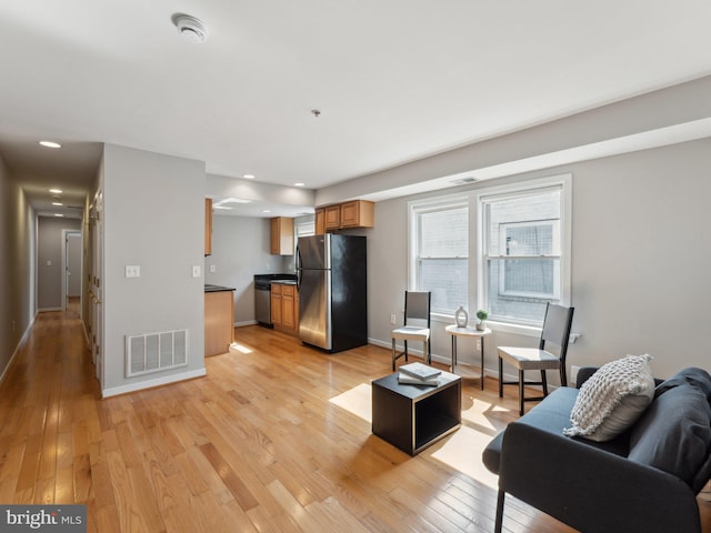 living room featuring light hardwood / wood-style flooring