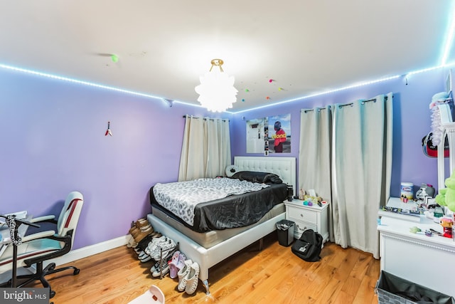 bedroom featuring hardwood / wood-style floors