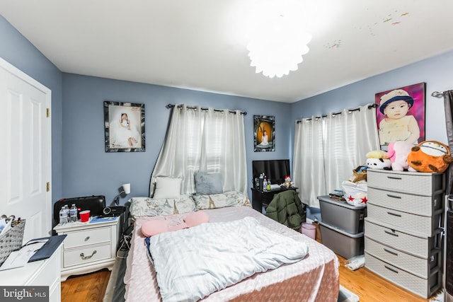 bedroom featuring light hardwood / wood-style floors