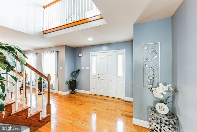 foyer with light wood-type flooring