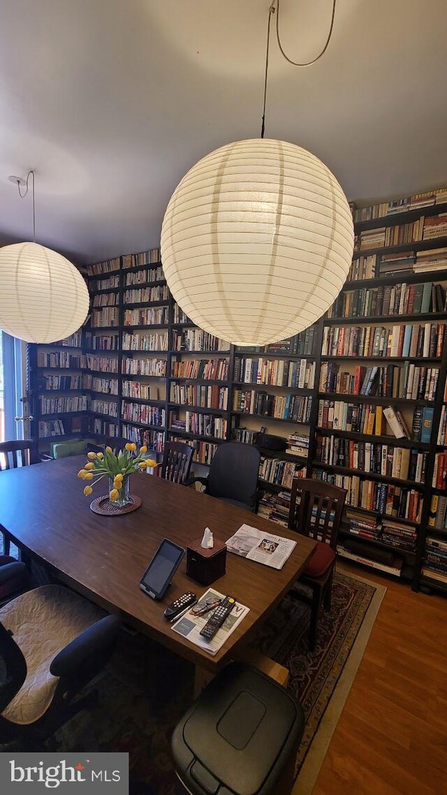 home office featuring hardwood / wood-style floors