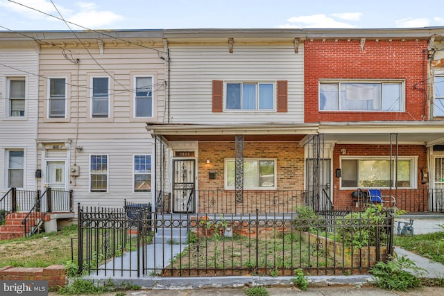 multi unit property featuring covered porch