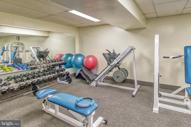 exercise room with a drop ceiling