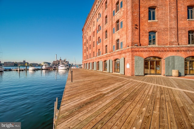 dock area with a water view