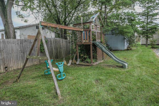 view of play area with a lawn