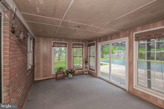 view of unfurnished sunroom