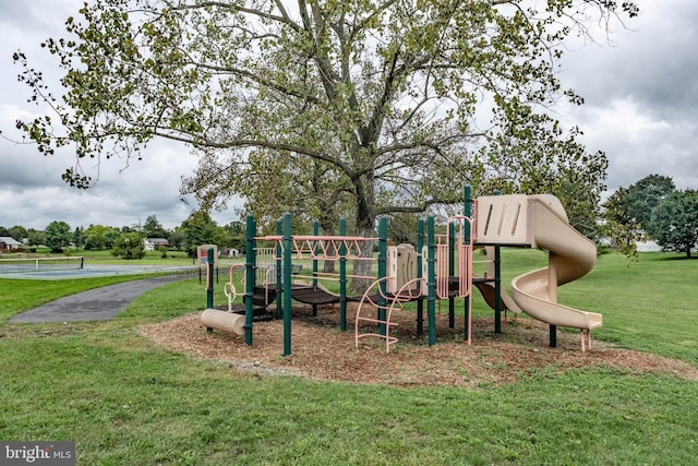 view of jungle gym with a yard