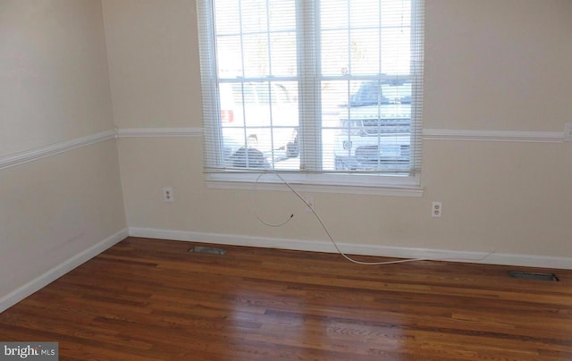 1184 Bannister Cir, Waldorf, MD 20602 - empty room featuring healthy amount of natural light, wood finished floors, and baseboards