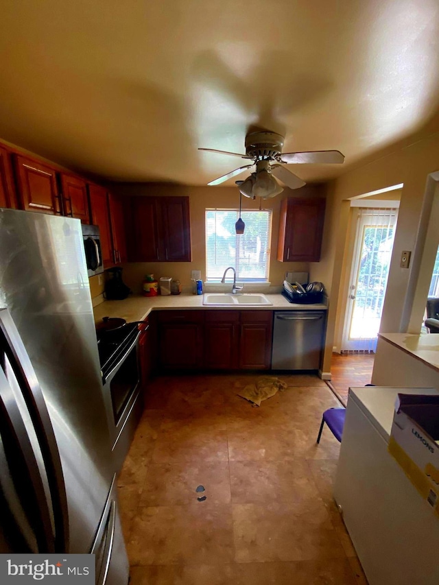 1184 Bannister Cir, Waldorf, MD 20602 - kitchen featuring stainless steel appliances, a sink, light countertops, and ceiling fan