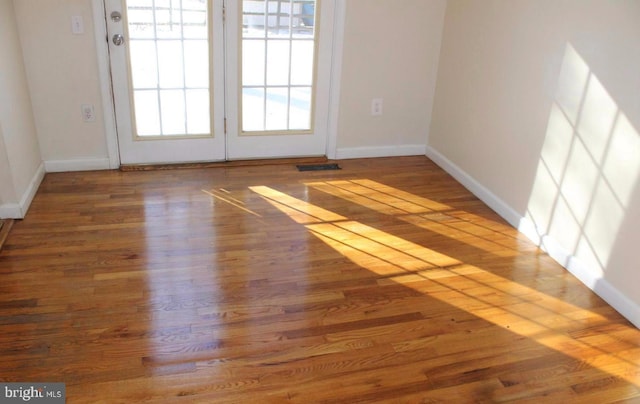 1184 Bannister Cir, Waldorf, MD 20602 - unfurnished room with baseboards and wood finished floors