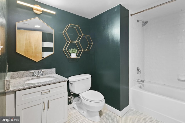 full bathroom featuring vanity, tile patterned flooring, toilet, and tiled shower / bath combo