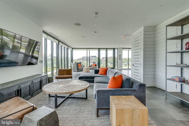 living room featuring concrete flooring