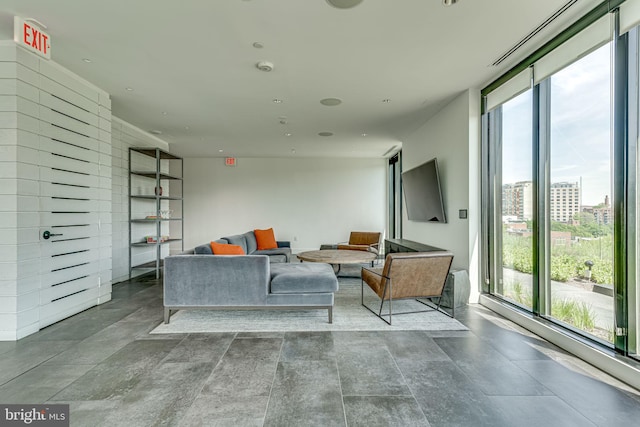 57 N St NW Unit 433, Washington, DC 20001 - living room featuring a healthy amount of sunlight and floor to ceiling windows