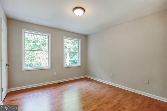 empty room featuring light hardwood / wood-style floors