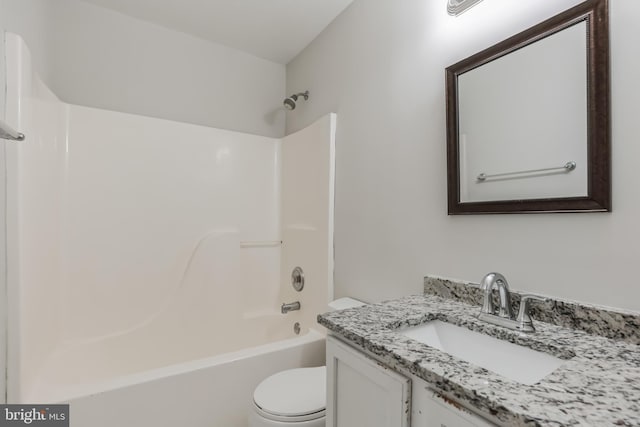 full bathroom featuring shower / bath combination, toilet, and vanity