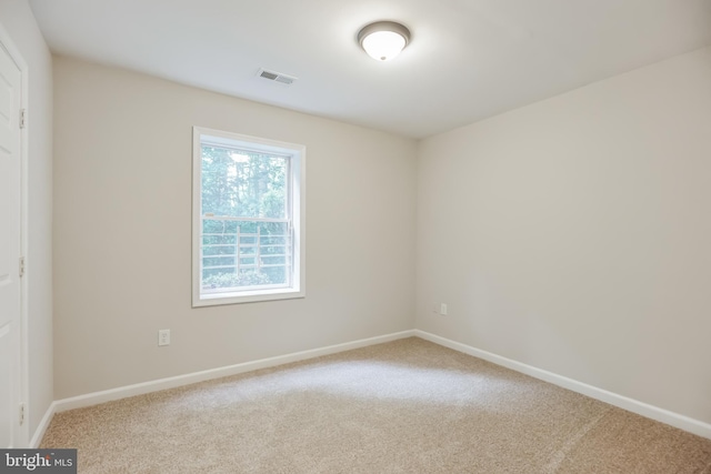 view of carpeted spare room