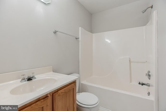 full bathroom with bathtub / shower combination, toilet, and vanity